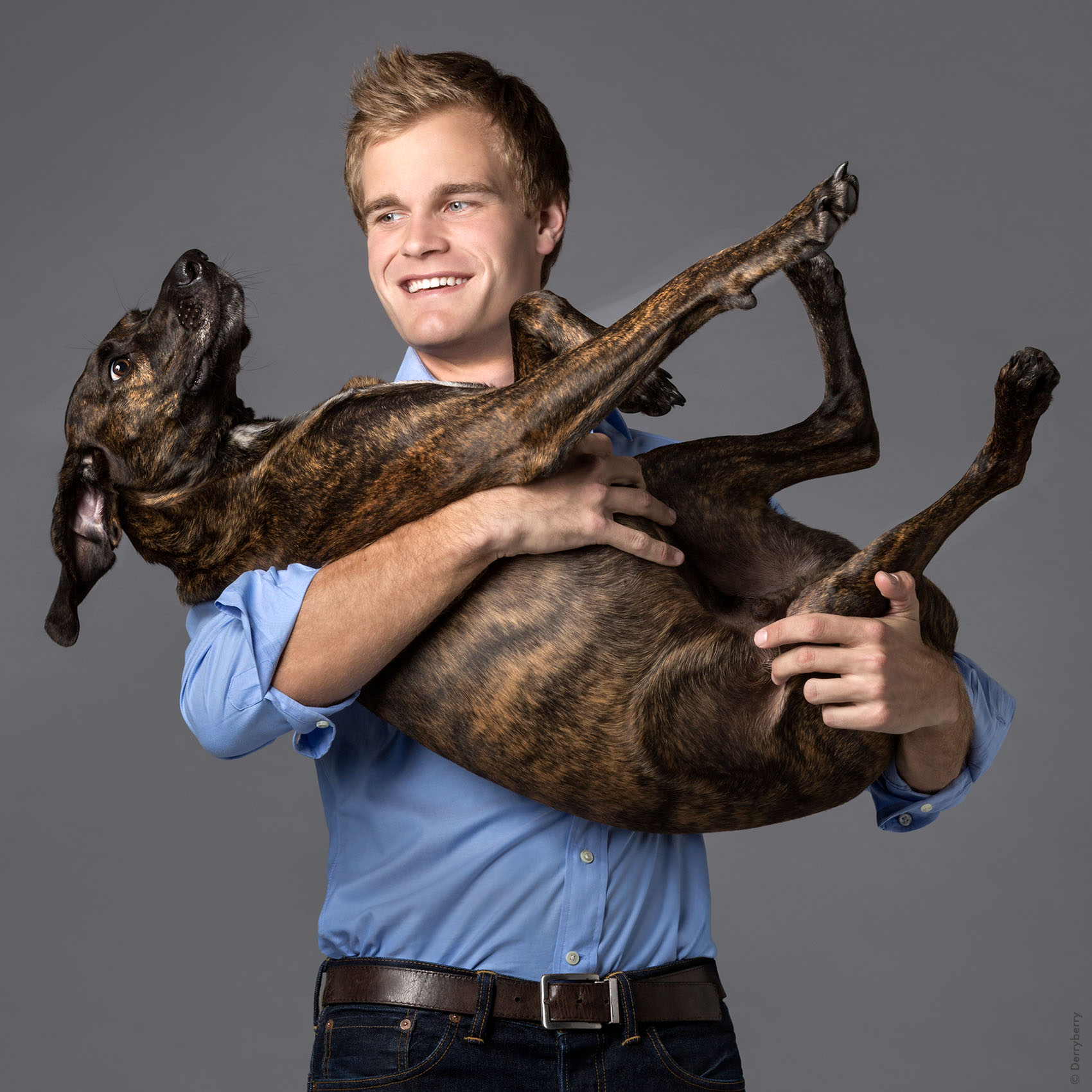 Color portrait of Nick Boulle and his pet dog  in Dallas, Texas by photographer John Derryberry Photography