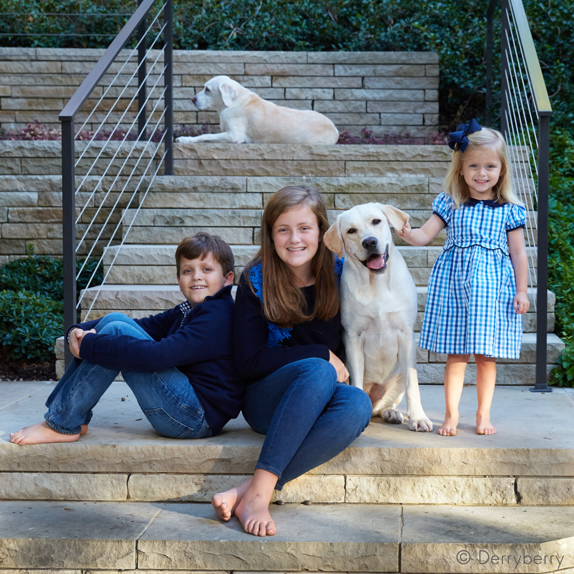 Color portrait of the Gillikin Children outside on the stairs  in Bluffview, Dallas, Texas by photographer John Derryberry Photography