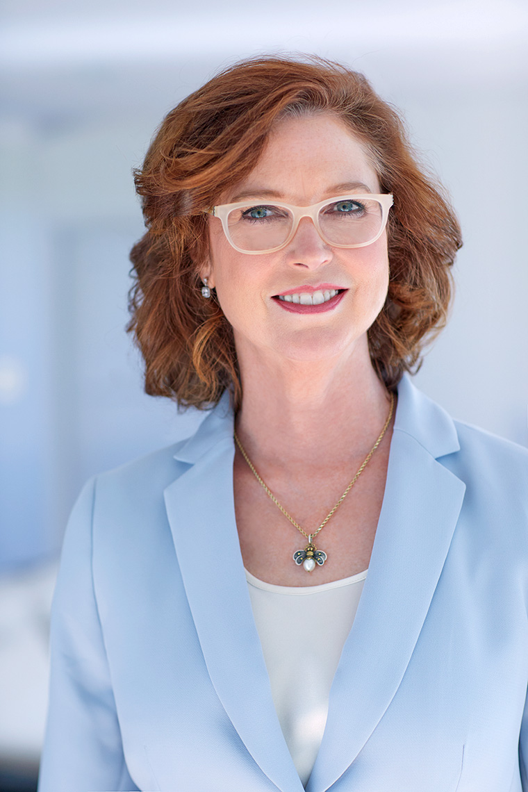 Color head shot portrait for lawyer Grace Weatherly  in Dallas, Texas by photographer John Derryberry Photography for Abota