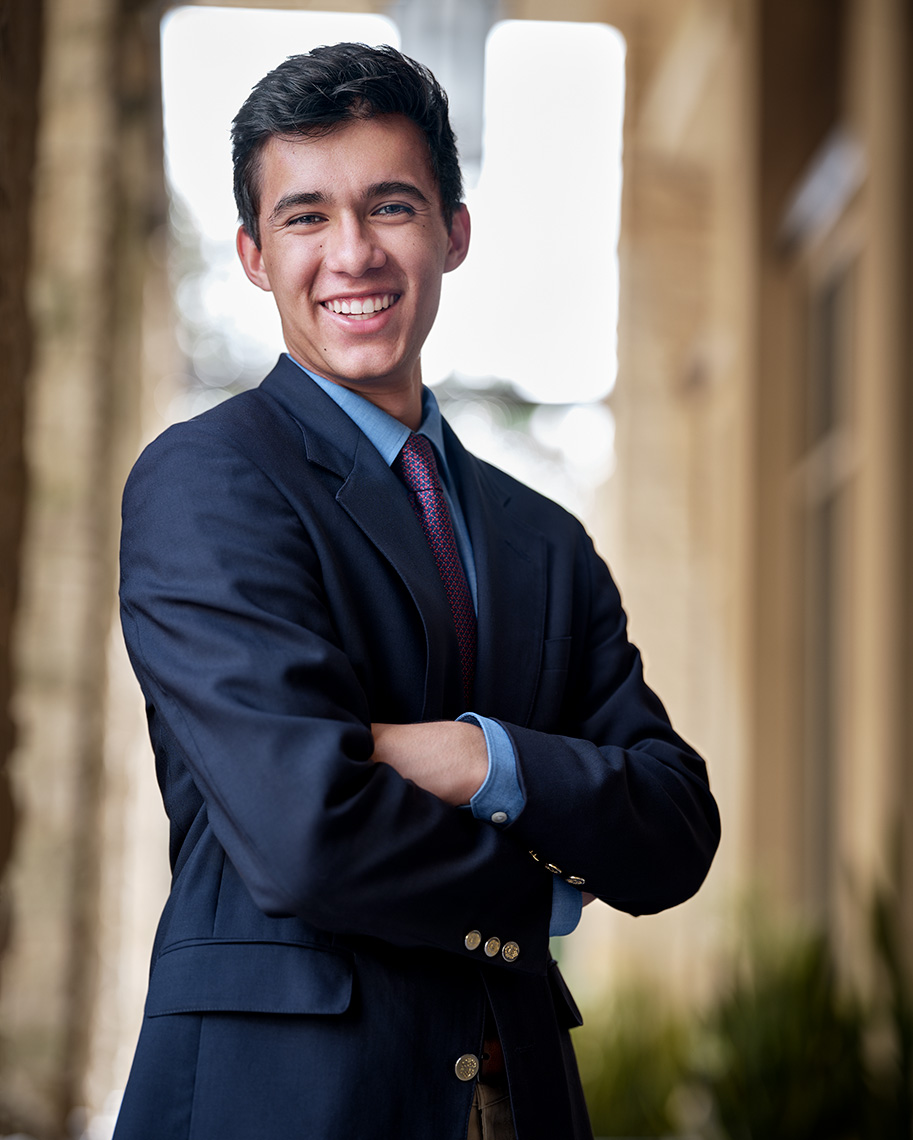 Senior Portrait on Location of Greenhill School teen Luke Contreras dressed in a jacket  in Plano, Texas by photographer John Derryberry Photography