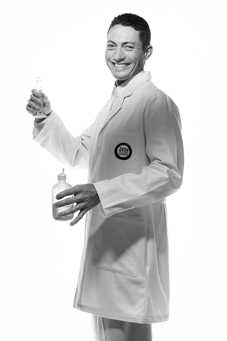 Black and White portrait of the stain doctor at Avon Cleaners in Dallas Texas by photographer John Derryberry Photography