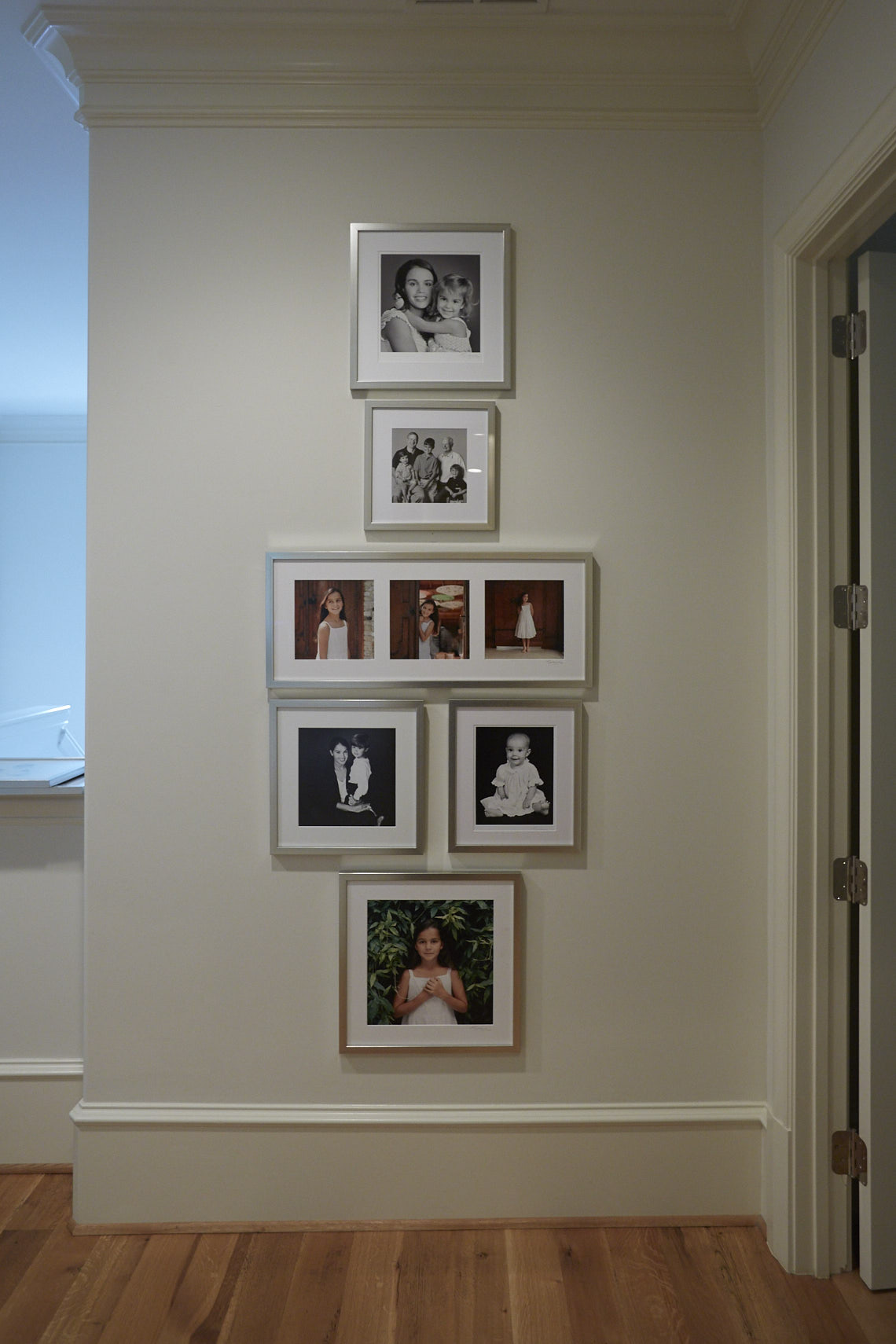 Beecherl home hall  wall gallery  collection of portraits by Dallas, Texas photographer John Derryberry Photography