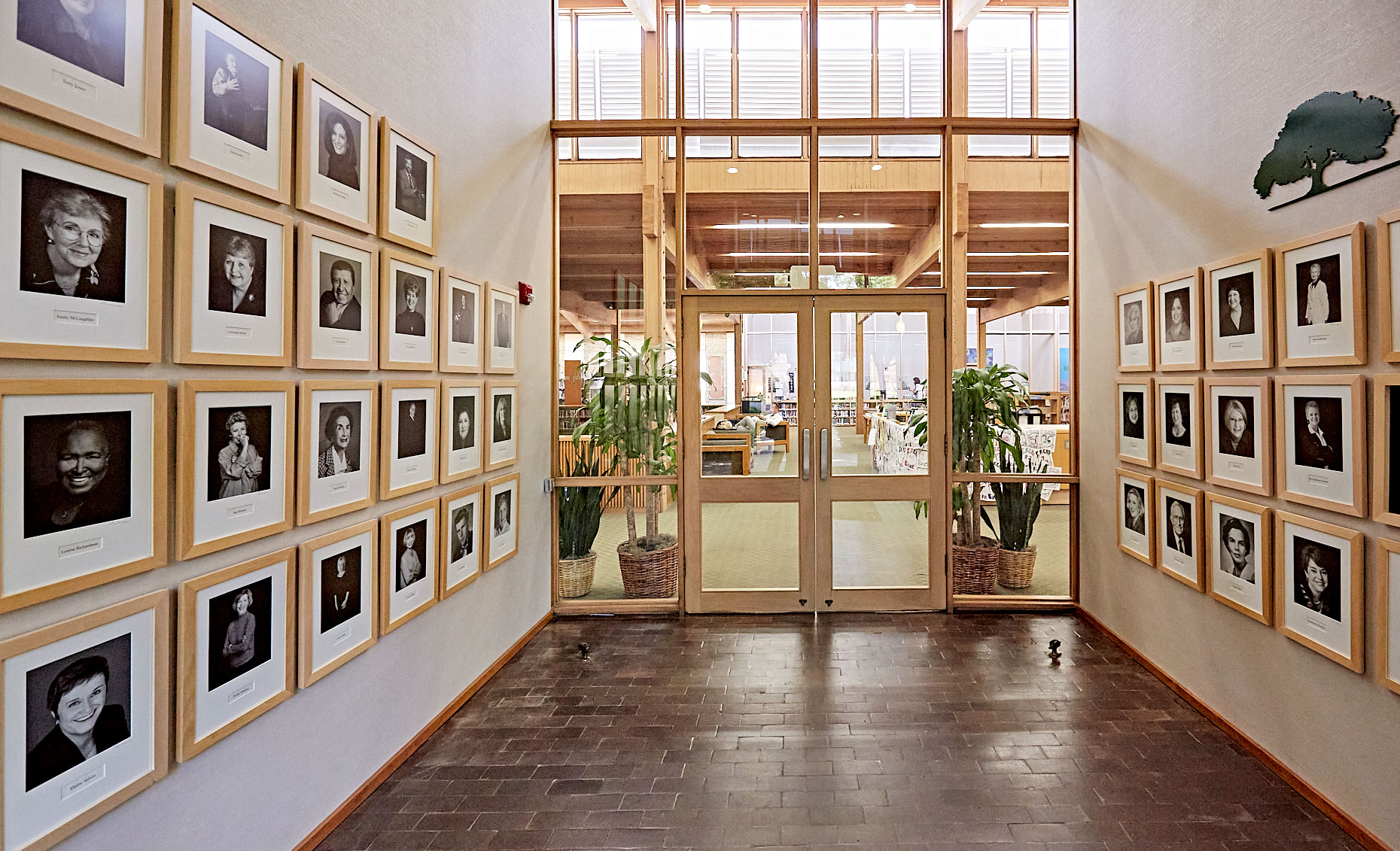 Two wall of the Greenhill School Legends Gallery in the library  in Dallas, Texas by photographer John Derryberry Photography